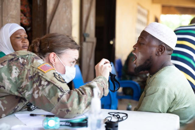 American and Ghana military provide medical care to civilians